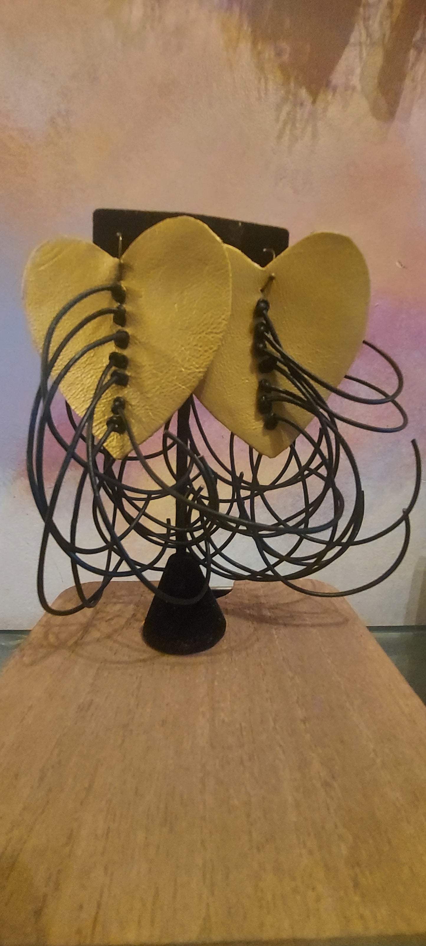 heart shaped fringed leather