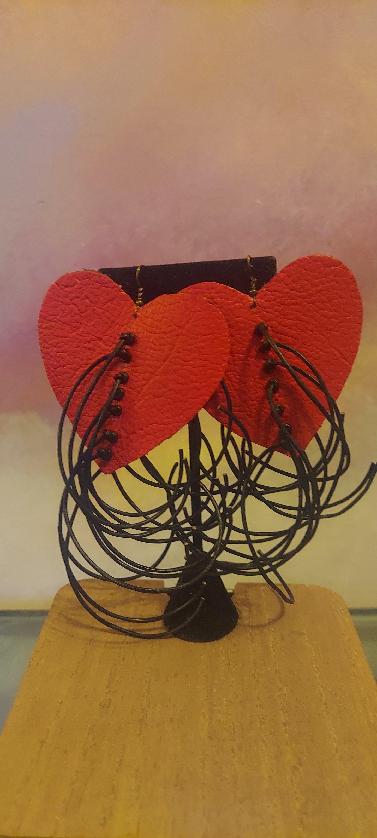 heart shaped fringed leather