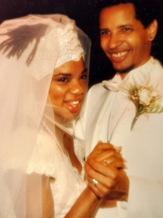 Afrocentric headpiece designed by the bride that launched "Legacy Beauloni" the crowning glory of a bride's and groom's ensemble.